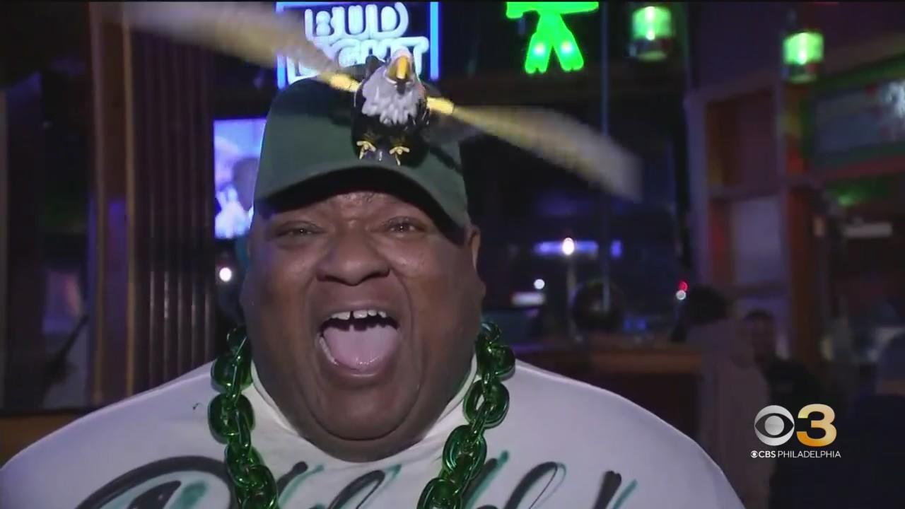 Philadelphia sports fans celebrating after victorious weekend