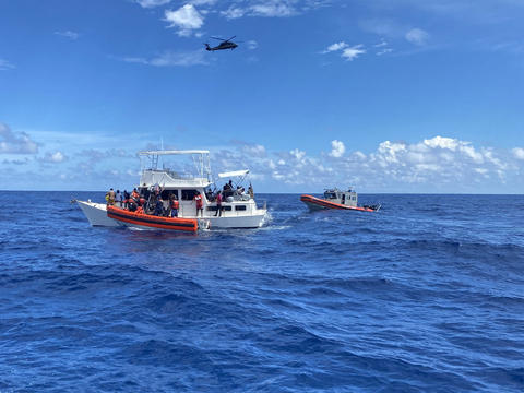 Nearly 100 rescued from boat off Florida coast had no food or water, Coast Guard says 