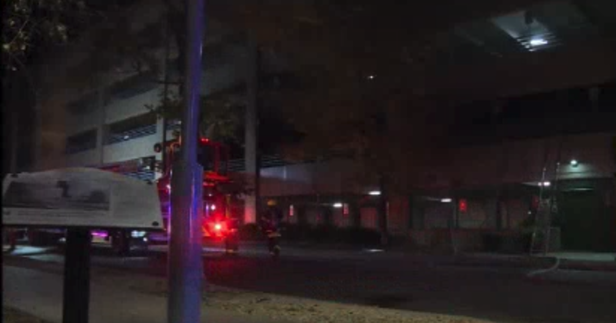 Crews extinguish cars on fire in south Minneapolis parking ramp - CBS ...