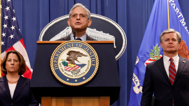 U.S. Attorney General Garland announces the results of operations conducted against alleged attempts by China to steal U.S. technology, at the Justice Department in Washington 