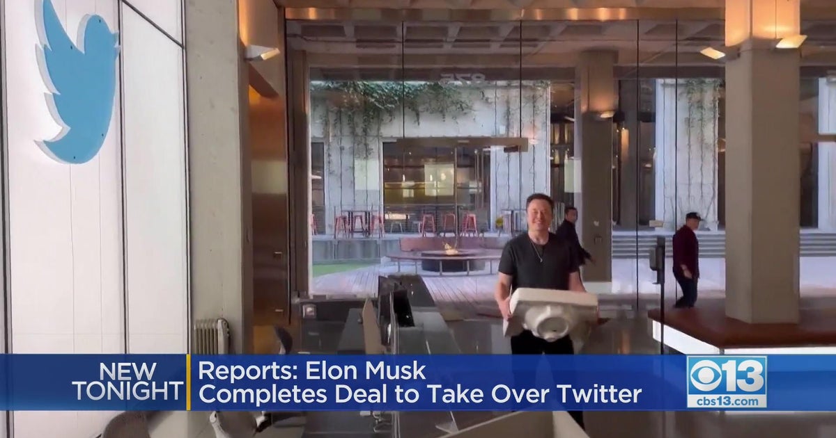 Elon Musk walks into Twitter building with a sink after buying platform ...