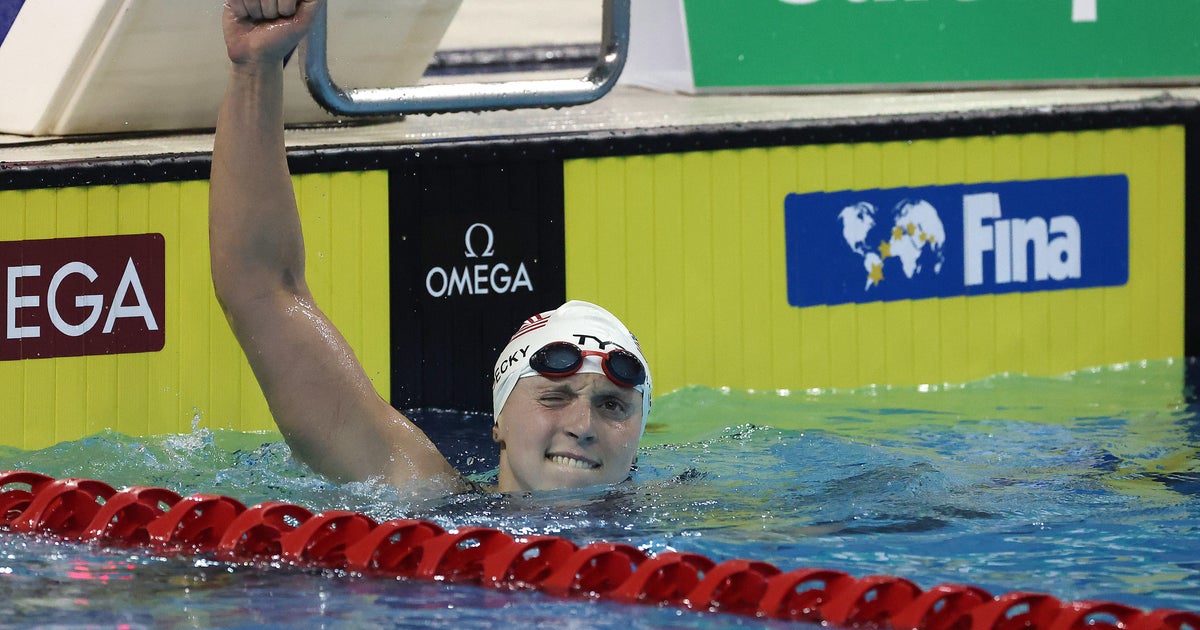 Katie Ledecky shatters world record in 1,500-meter freestyle: "It hurt a lot"