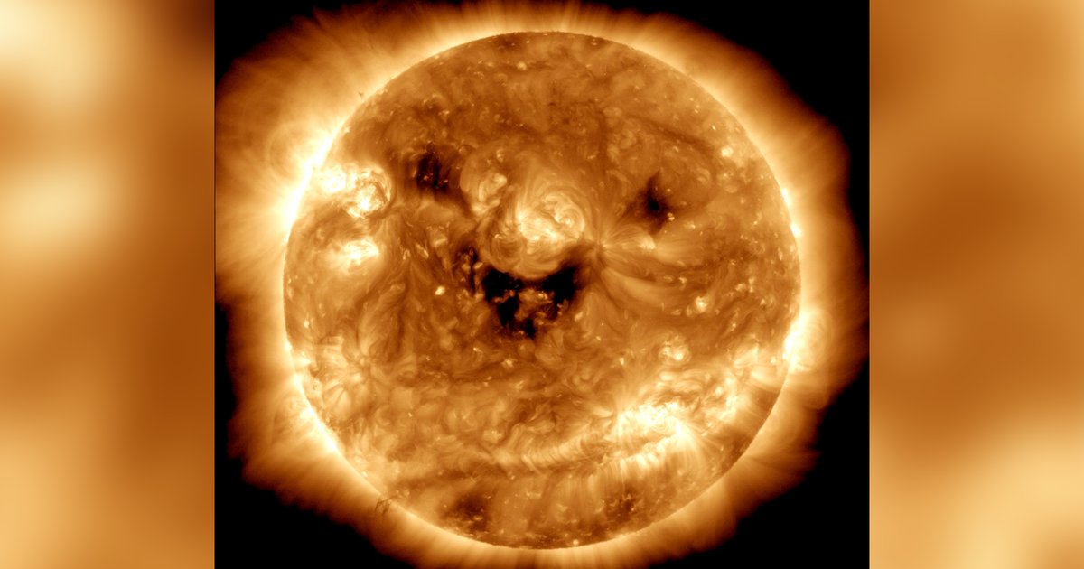 NASA took a picture of a “giant space pumpkin”.  Here’s the science behind the “smiling” sun.