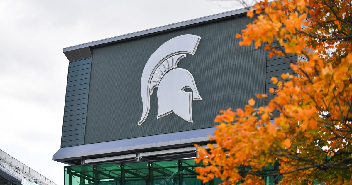 Michigan State suspends four players after video shows Michigan University player being attacked after game