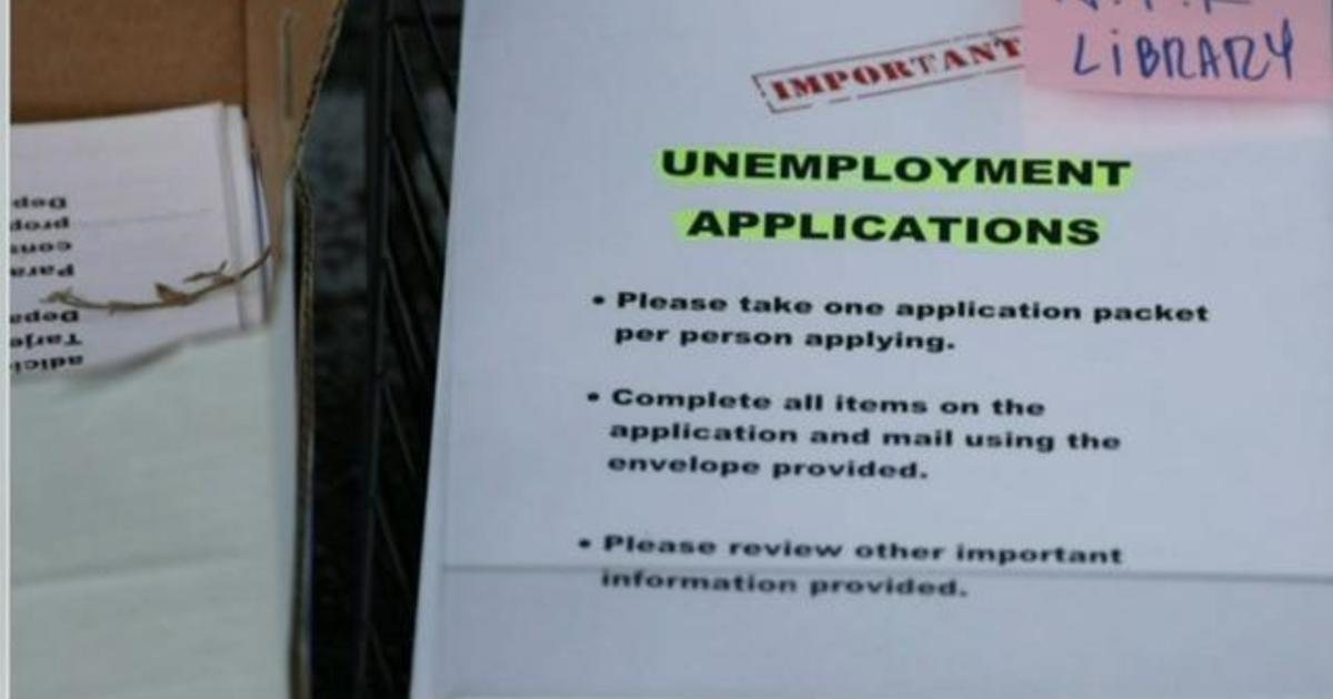 Jobless claims fall as Fed raises interest rates