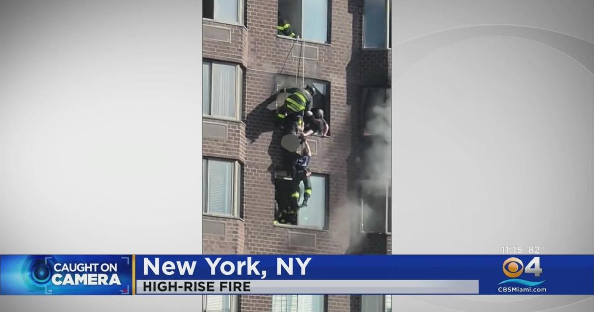 caught-on-camera-new-york-firemen-make-high-rise-rescue-cbs-miami