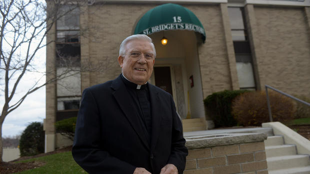 (Framingham, MA, 04/23/14)  Pastor Monsignor Francis Strahan of St. Bridget's Parish in Framingham, talked to Jess Heslam about leading the choir for Pope John Paul II on Boston Common in 1979. Wednesday, April 23, 2014. Staff photo by Ted Fitzgerald 