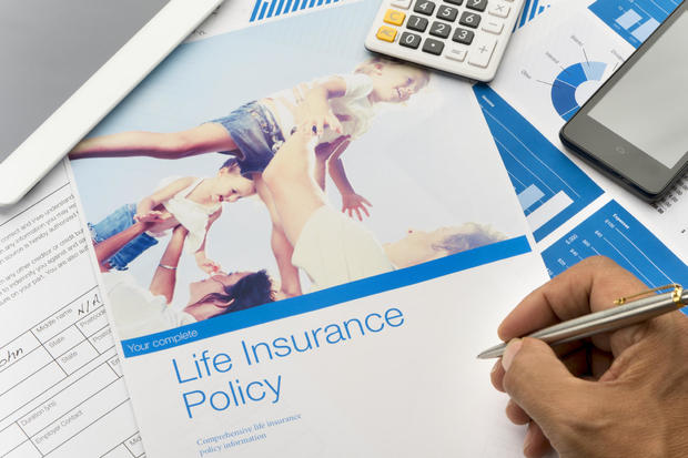 Life insurance brochure with family image 