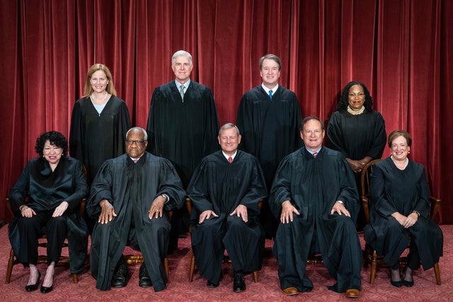 Members of the Supreme Court sit for a group photo on Friday, Oct. 7, 2022. 