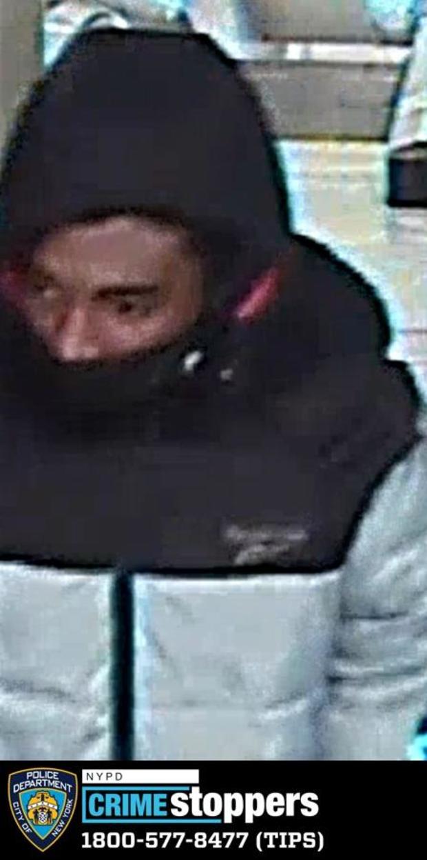 Surveillance photos of man wanted in connection to a robbery at a subway station in Midtown. 