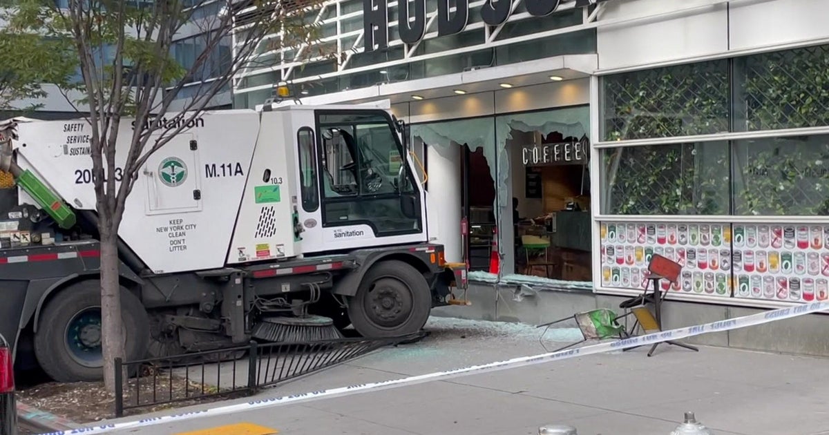 NYPD Street sweeper crashes into Hell's Kitchen eatery after being