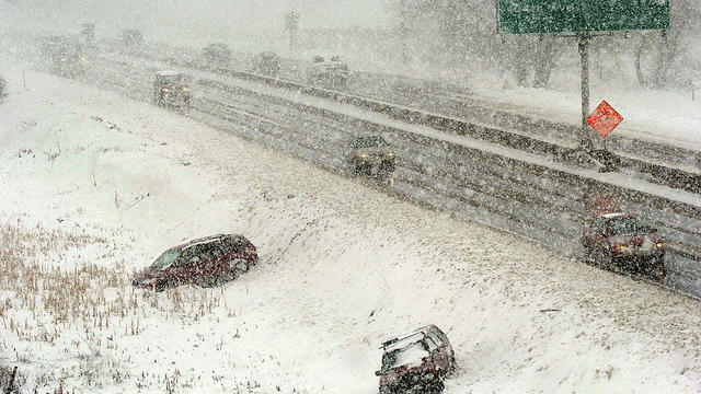 WESTMINSTER, COLORADO--APRIL 10, 2005--Abandoned cars line a ditch along US 36 (the Boulder turnpike) near 92nd Avenue during a spring blizzard that hit the Denver metro area on Sunday, nearly paralyzing the area with heavy wet snow and strong wind gusts. 
