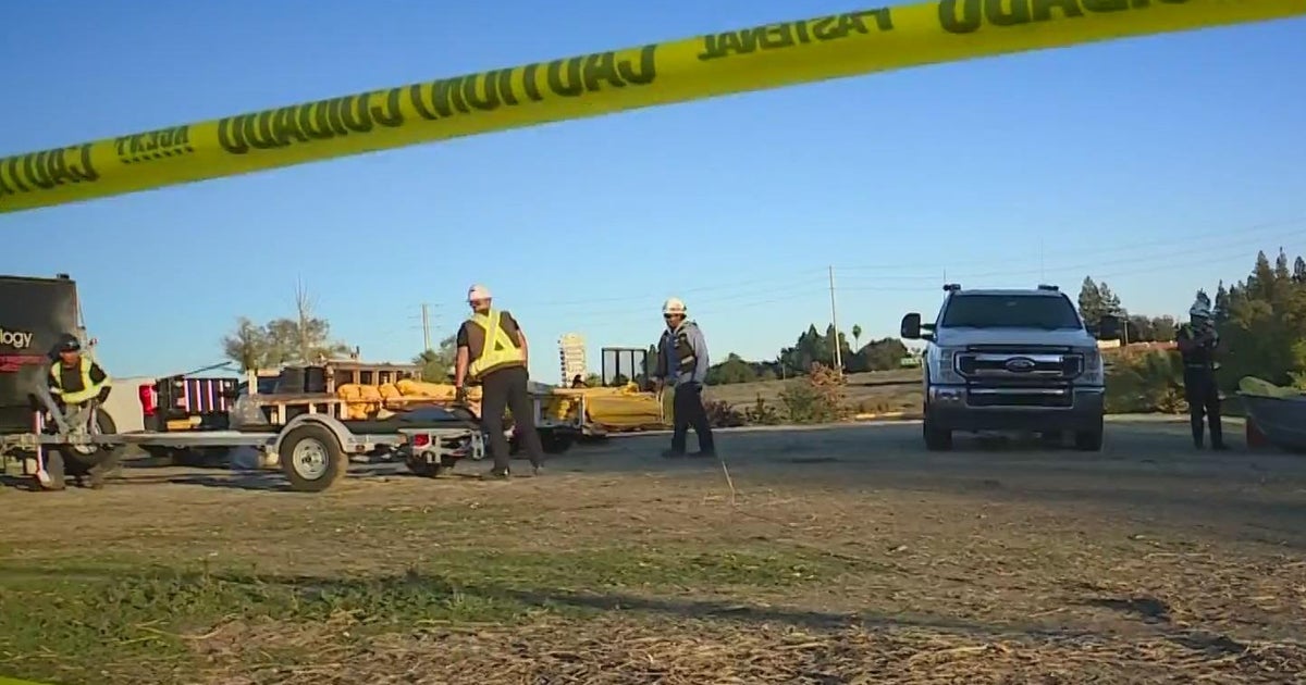 Crews continue to cleanup an oil spill in Natomas at Tanzanite Park