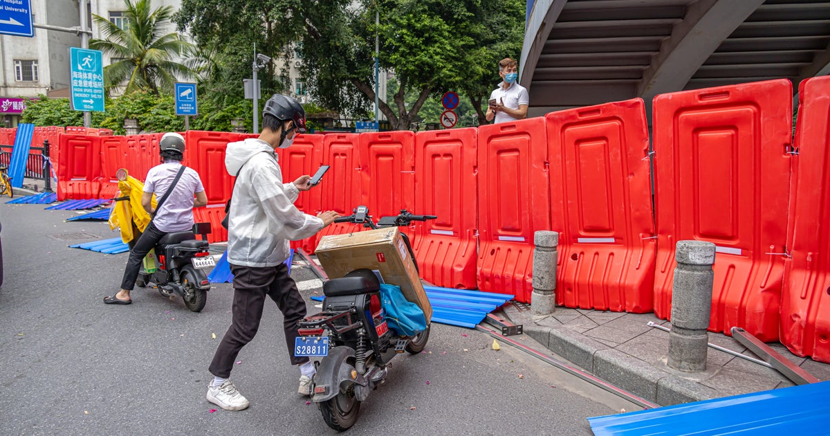 Even as kids' deaths blamed on COVID restrictions, China responds to soaring cases with more quarantine beds