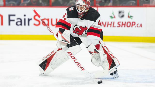 New Jersey Devils Goalie Akira Schmid (40) directs the puck to the corner during first period National Hockey League action between the New Jersey Devils and Ottawa Senators on November 19, 2022, at Canadian Tire Centre in Ottawa, ON, Canada. 