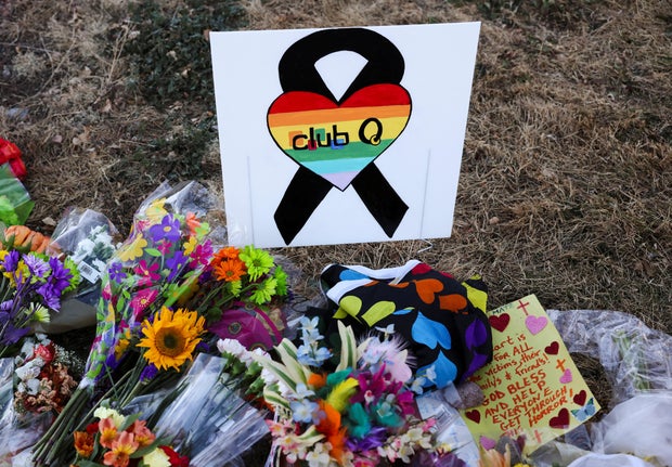 Floral tributes are placed in memory of the victims after a mass shooting at the Club Q nightclub in Colorado Springs, Colorado, November 20, 2022.