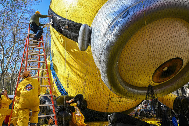 The Macy's Inflation Team prepare the Stuart The Minion balloon ahead of the 96th Macy's Thanksgiving Day Parade on the Upper West Side on November 23, 2022 in New York City. 