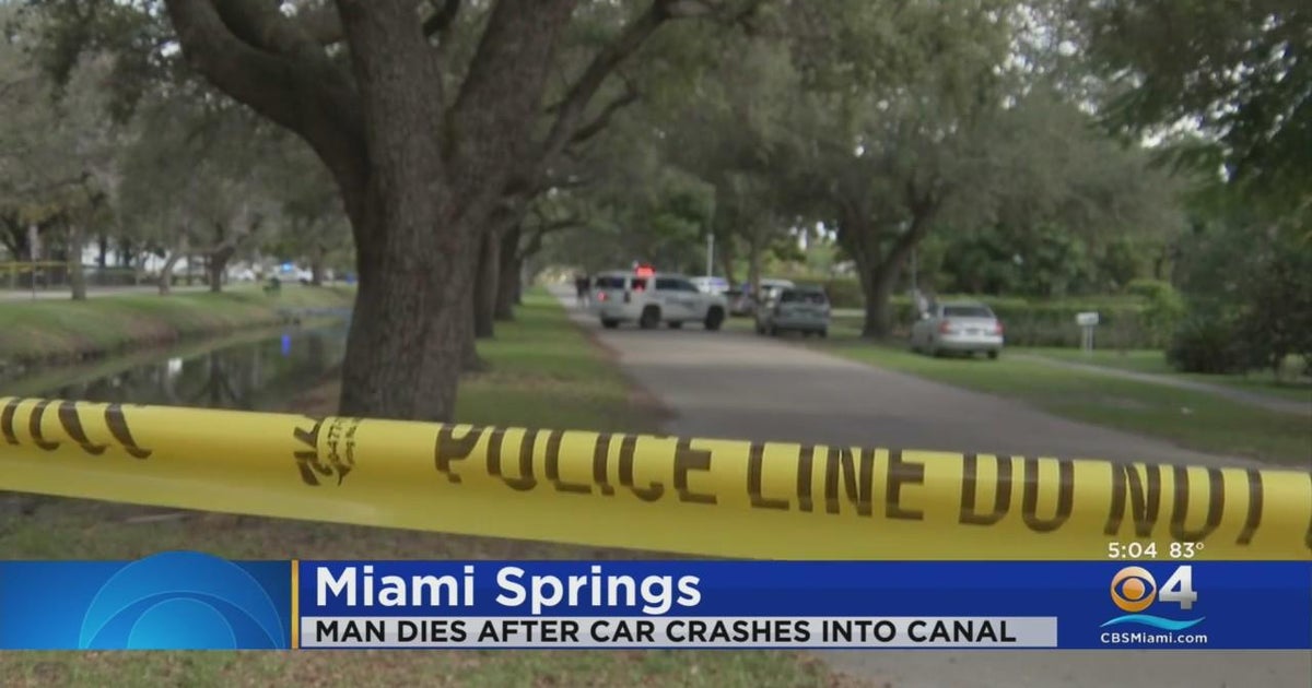 Man dies after car pulled from Miami Springs canal, police say - CBS Miami