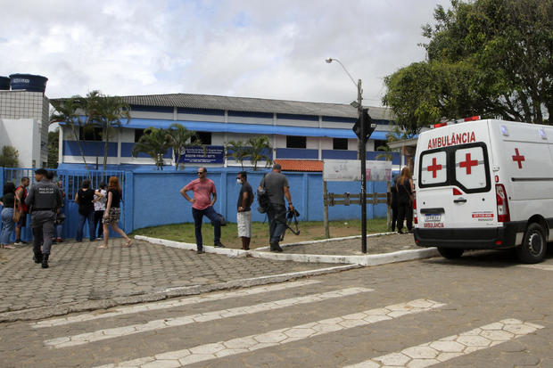 Teen suspect in Brazil school shootings which killed 4 wore swastika, police say 