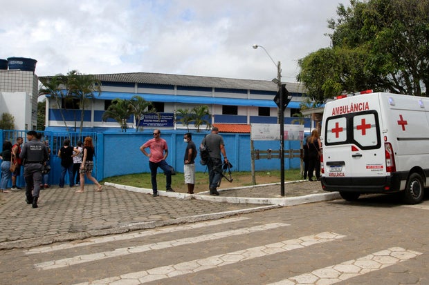 Teen suspect in Brazil school shootings which killed 4 wore swastika, police say 