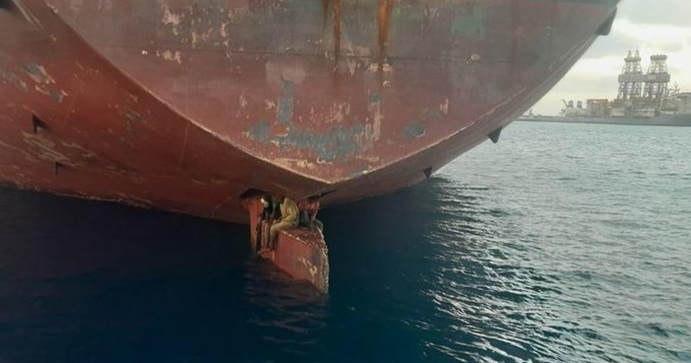 Photos show three stowaways rescued from oil tanker helm after supposedly 11-day ordeal