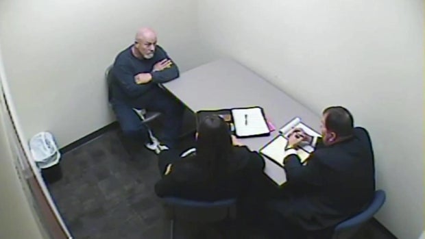 Joseph Mills question by detectives