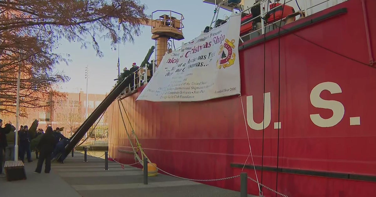 Christmas tree ship at Navy Pier unloading, delivering thousands of