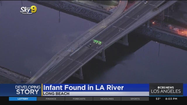 Black and white close-up of silver handcuffs 