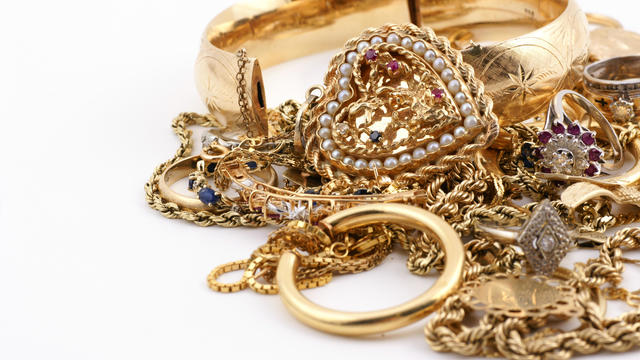 A messed up pile of gold jewelry 