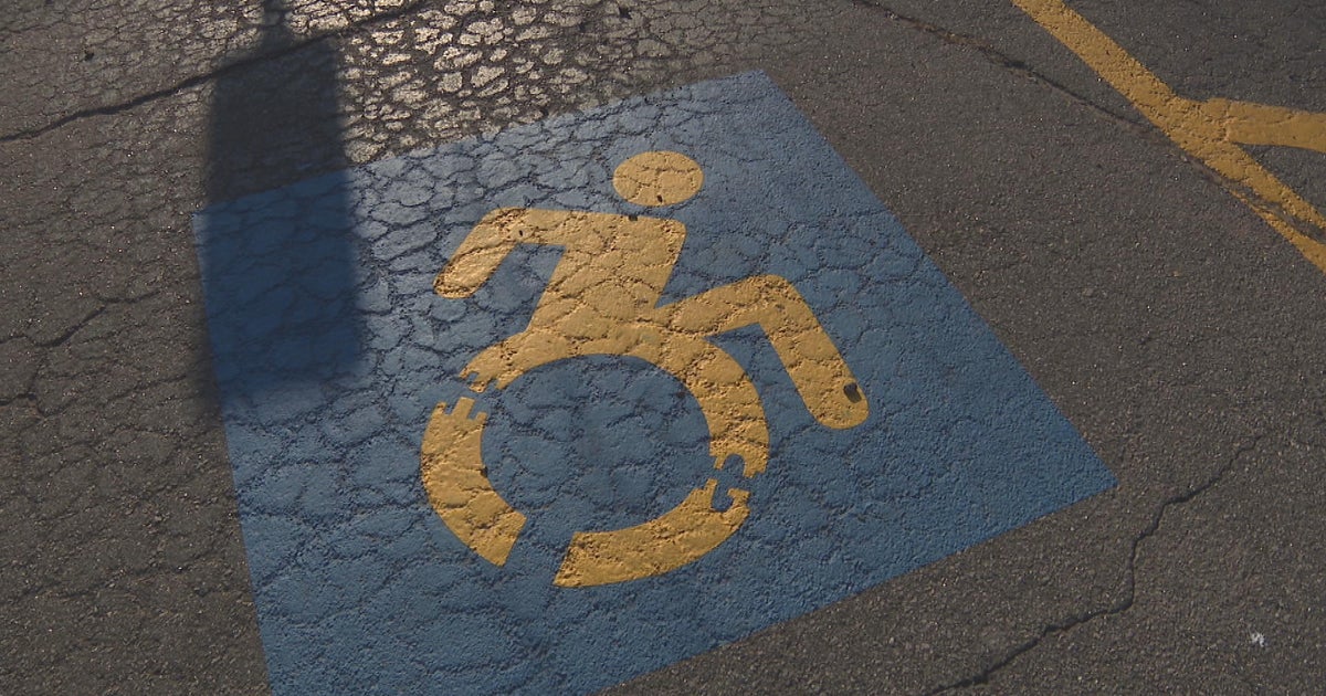 ITeam Woman receives handicap placard from RMV for someone who died