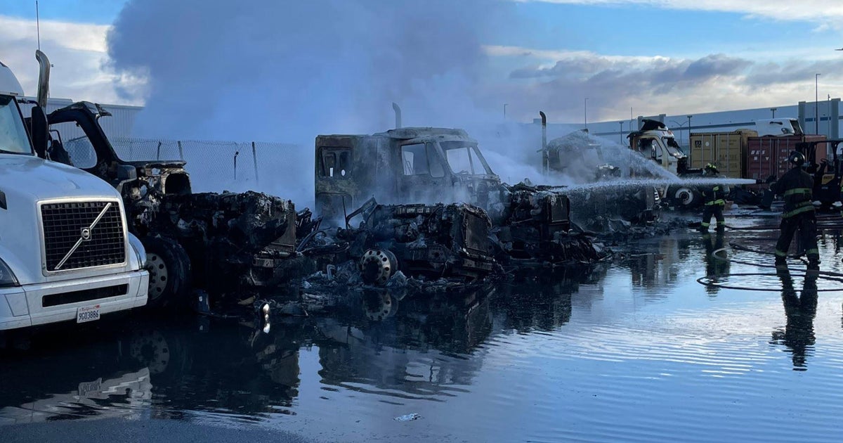 8 big rigs engulfed in flames in West Oakland CBS San Francisco