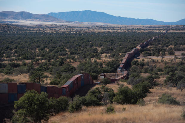 Shipping Containers Along US-Mexico Border Draws Protest From Environmental Activists 