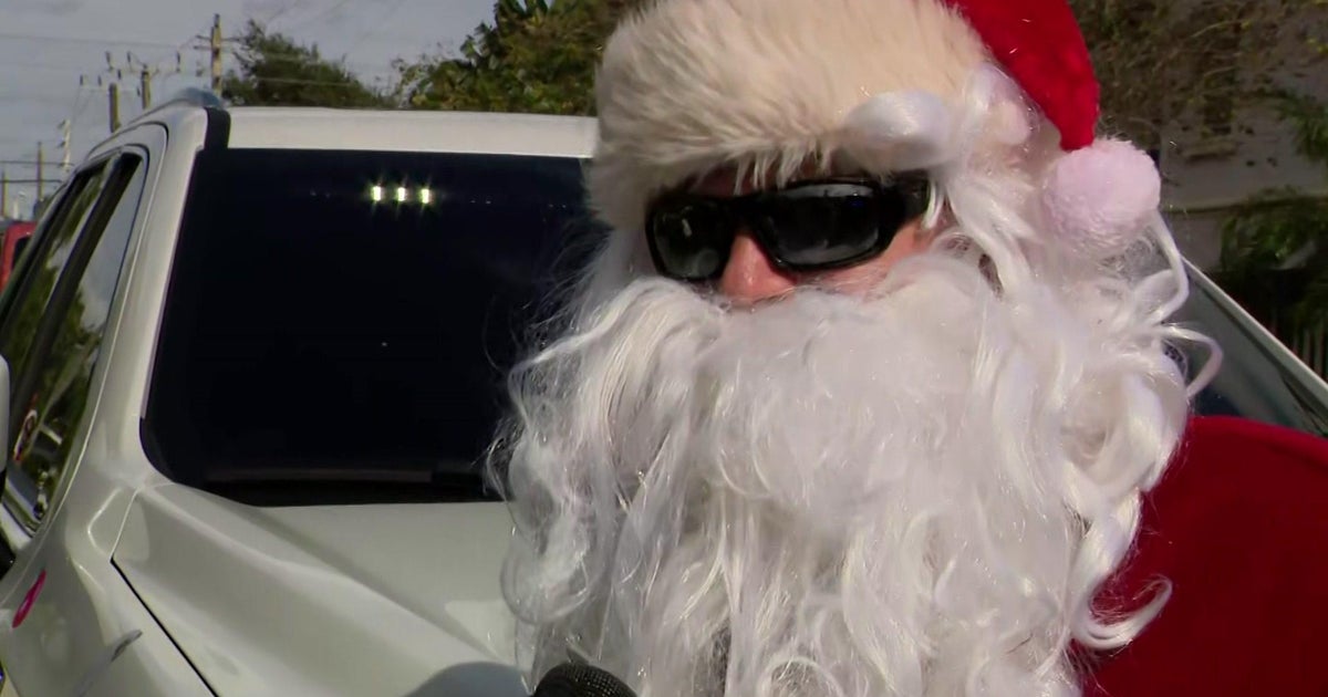 Santa spreads cheers, toys, tears of pleasure in Broward