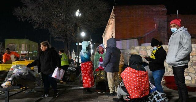 Thousands of migrants seeking asylum in U.S. overwhelm shelters in El ...