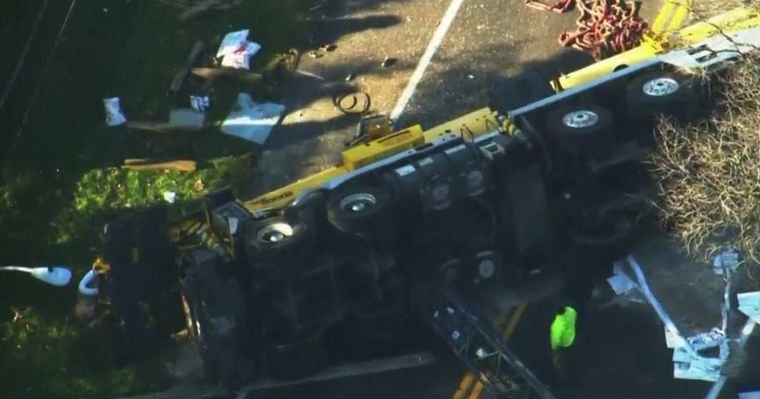 Crane truck overturns after car crash in Camden County CBS Philadelphia