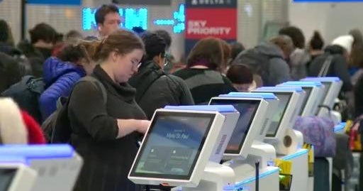 Several airlines waive change fees as winter storm, holiday travel set