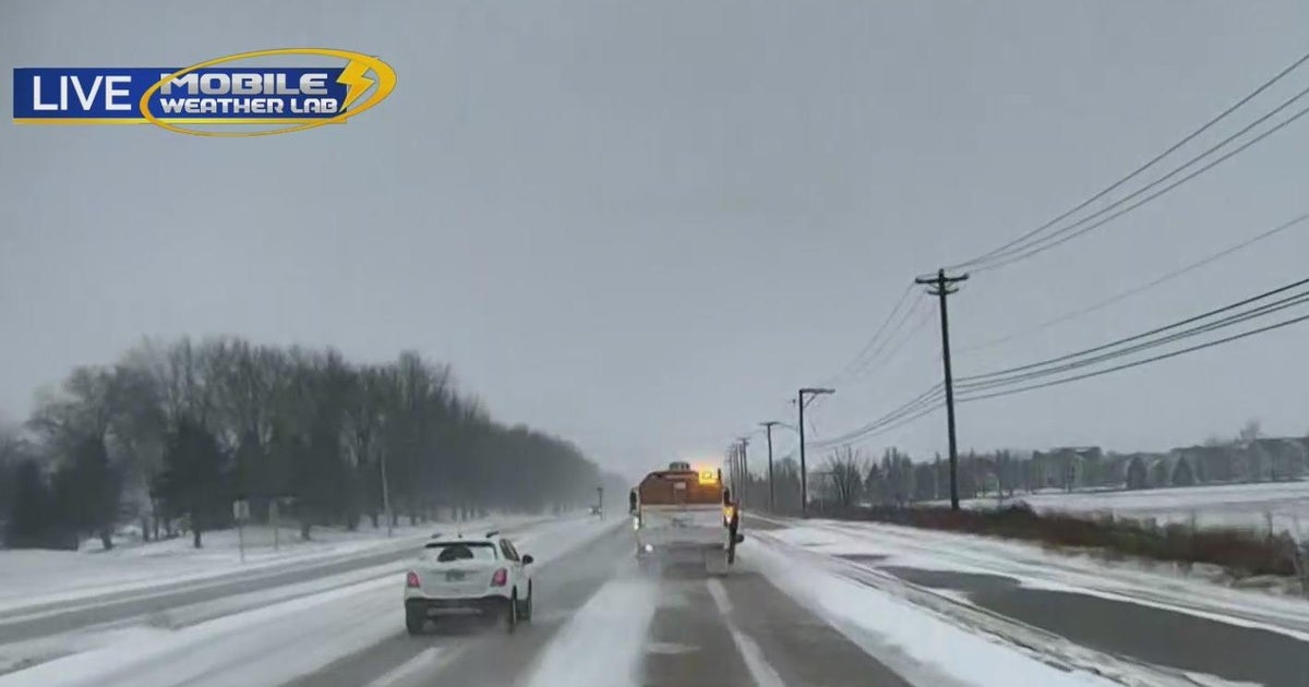 A live look at CBS 2's Mobile Weather Lab in Yorkville as snow falls on