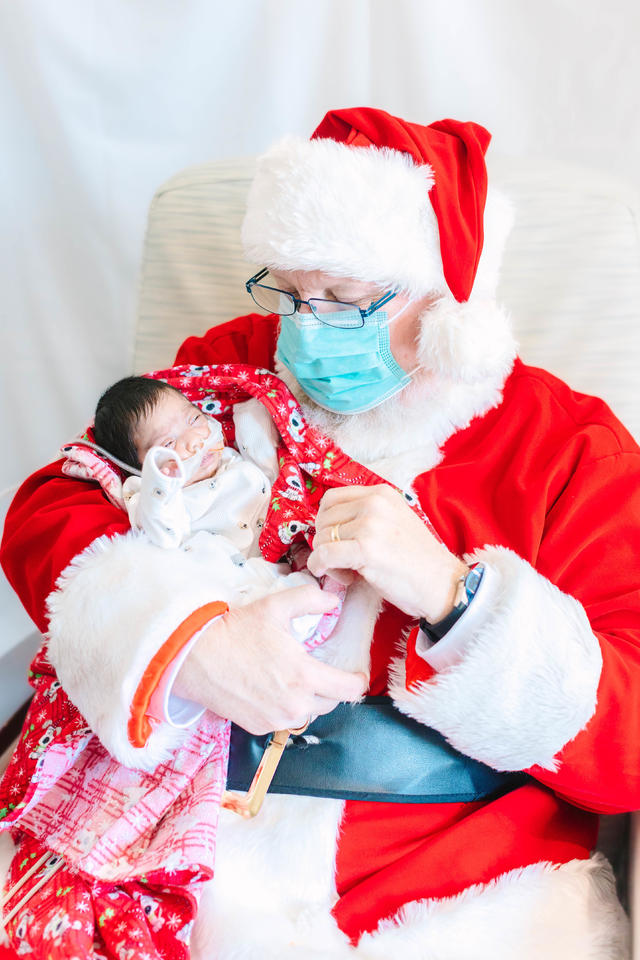 See photos of Santa visiting with tiny babies in a NICU