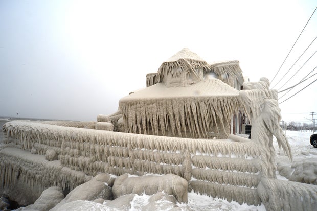 Ice covers Hoak's edifice  on  the Lake Erie shoreline connected  December 24, 2022, successful  Hamburg, New York. 