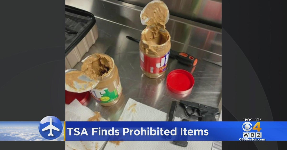 RI man arrested JFK Airport security finds gun parts inside peanut