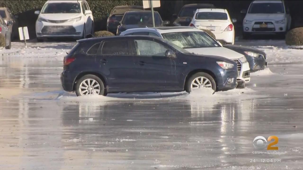 Day 4 of cars stuck in ice in Edgewater, N.J. parking lot - CBS New York