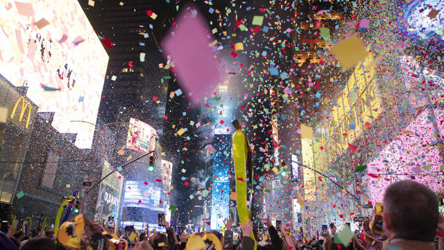 Confetti flies in the air as revelers celebrate during the Times Square New Year's Eve 2022 Celebration on January 1, 2022 in New York City. 