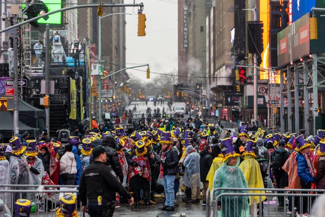 Revelers wait in pens after arriving more than 8 hours early ahead of New Year's Eve celebration in Times Square on December 31, 2022 in New York City. 