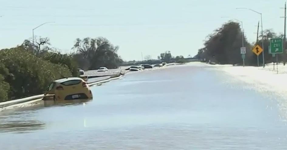 Dozens of drivers rescued from flooded Highway 99