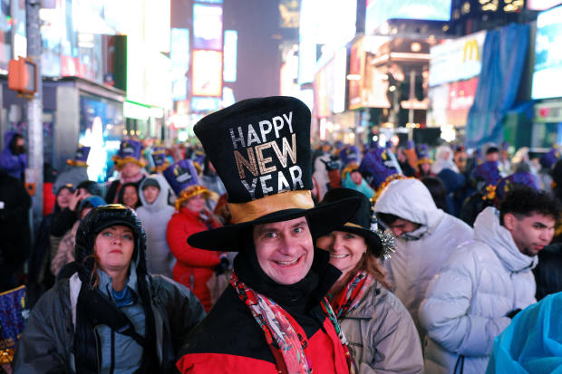 A person wearing a hat celebrates New Year's Eve in Times Square, New York City's first event without restrictions since December 31, 2022, when the coronavirus pandemic struck Manhattan borough. 