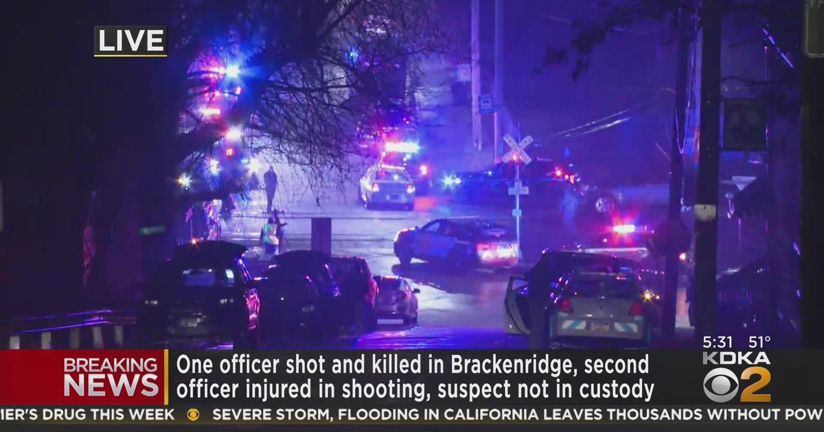 Sources 1 police officer dead, another injured after shooting in