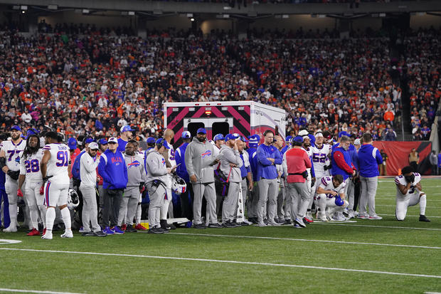 Buffalo Bills players look on after teammate Damar Hamlin #3 collapsed on the field after making a tackle against the Cincinnati Bengals during the first quarter at Paycor Stadium on January 02, 2023 in Cincinnati, Ohio. 