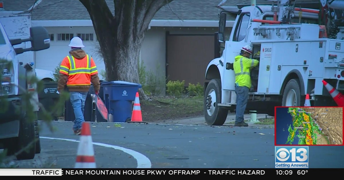 Damaging winds push down trees and knock out power