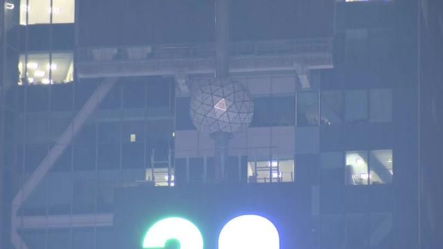 The New Year's Eve ball in Times Square is dark and the 2023 numerals are missing. 