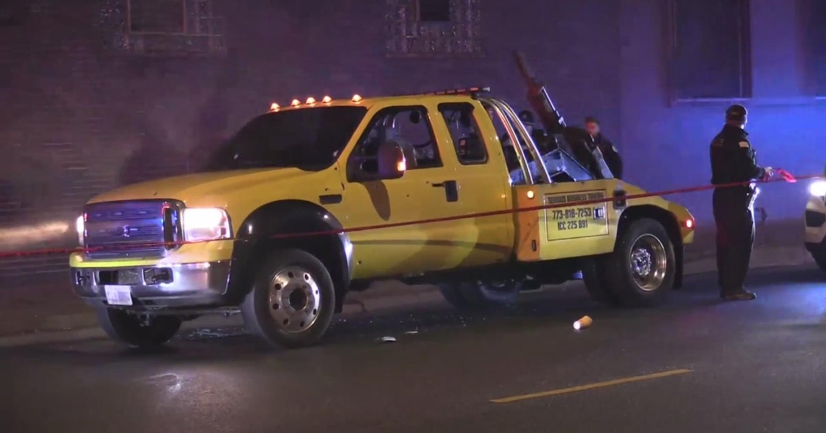 Two men shot in tow truck on North Side, bullet nearly misses sleeping ...